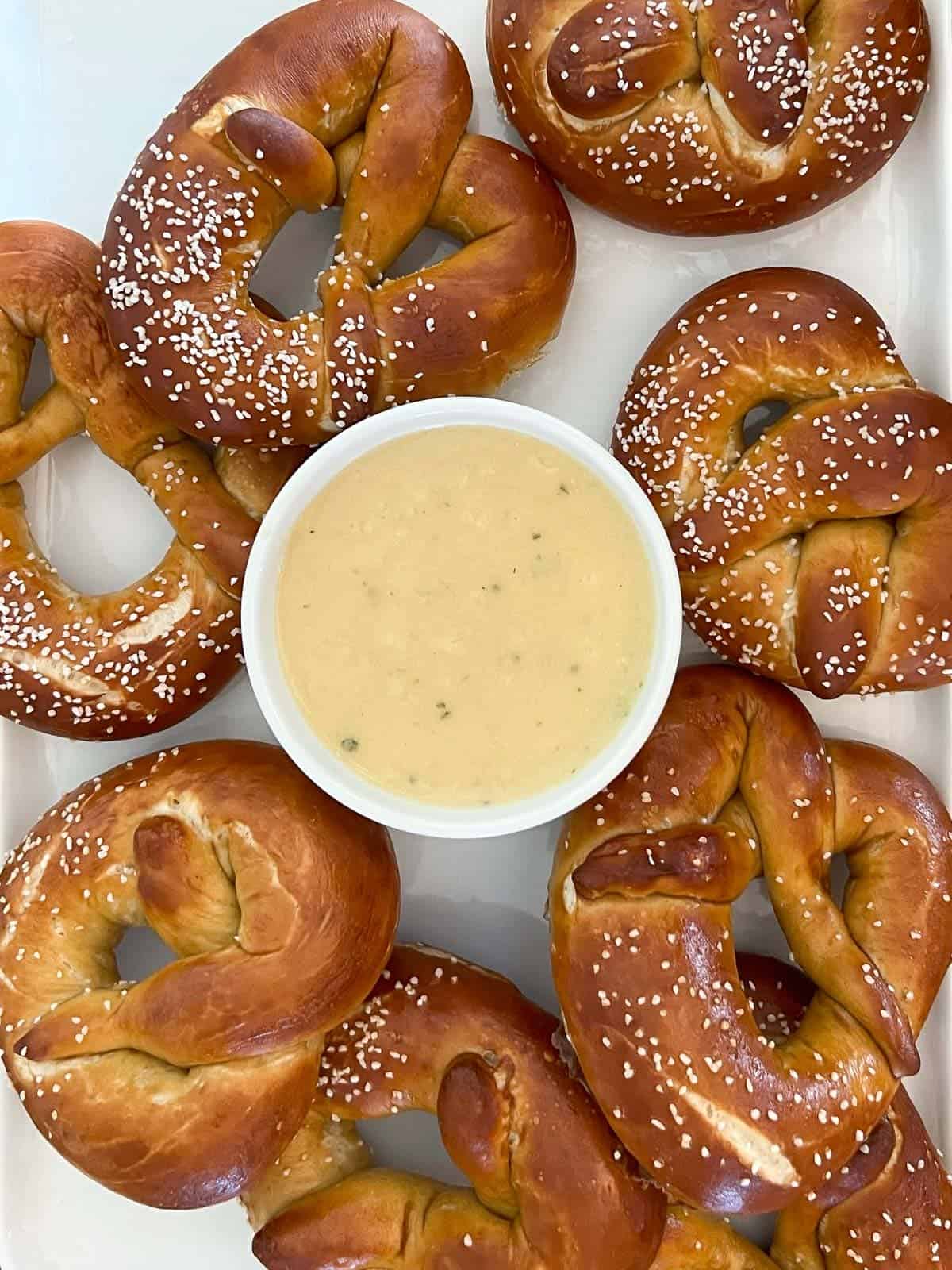 easy beer cheese recipe served with soft pretzels