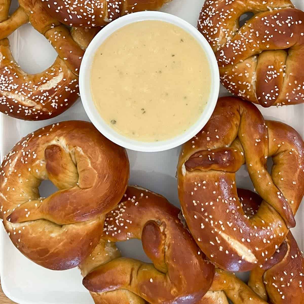 beer cheese recipe served with homemade soft pretzels.