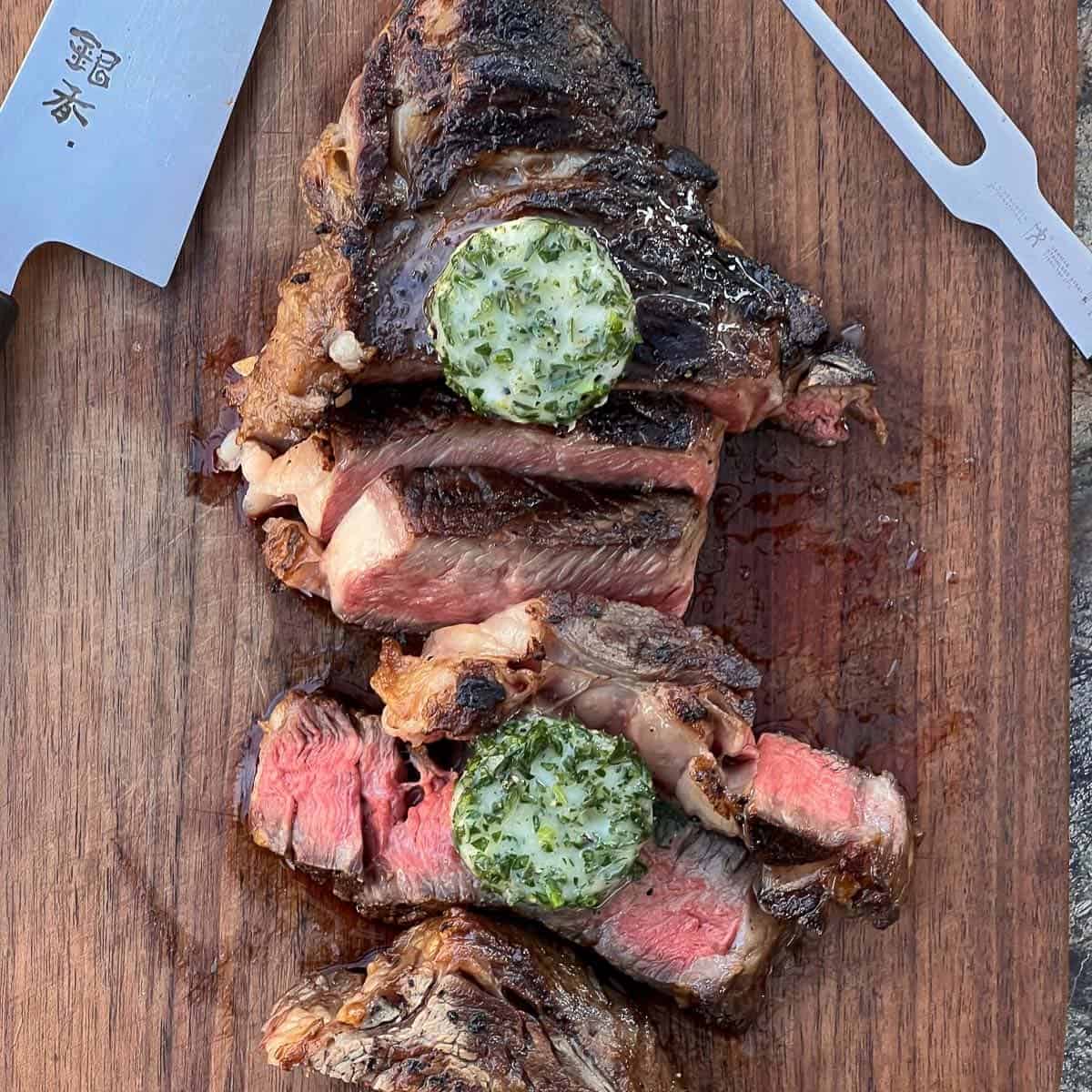 grilled steak served with compound butter