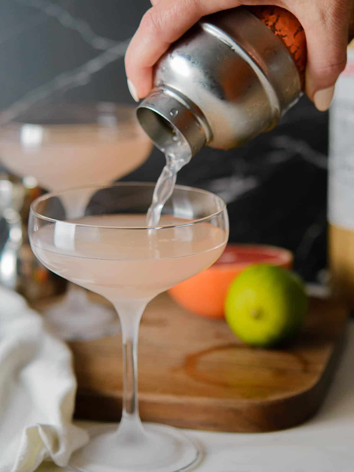 hemingway cocktail being poured into a chiled glass from a cocktail shaker