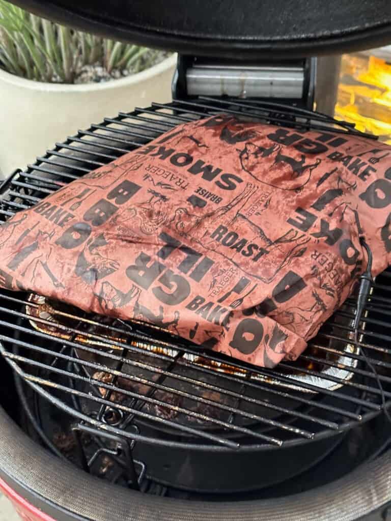 wrapped brisket back on the grill
