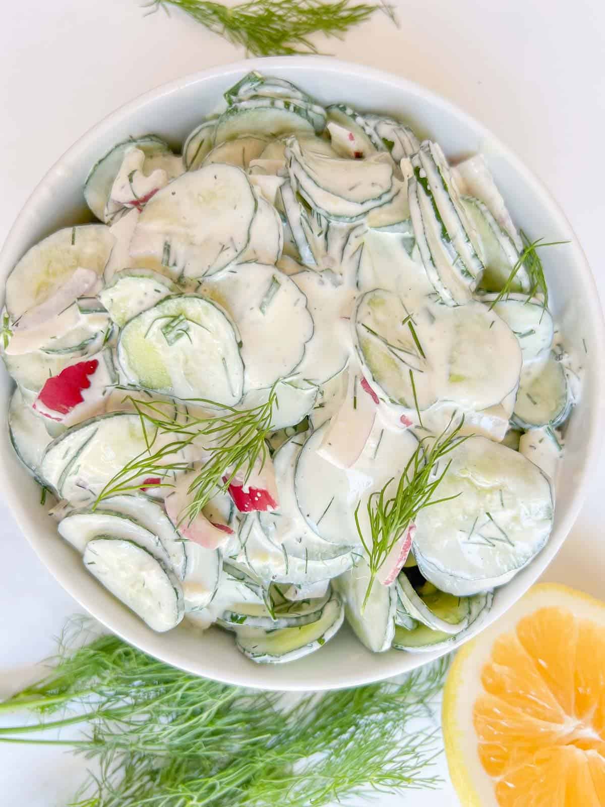 creamy cucumber salad with a sour cream and dill dressing