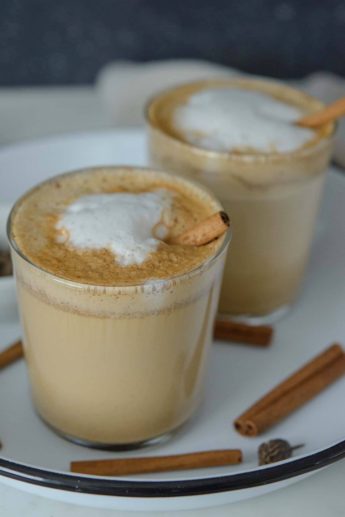 dirty chai latte served in clear mugs