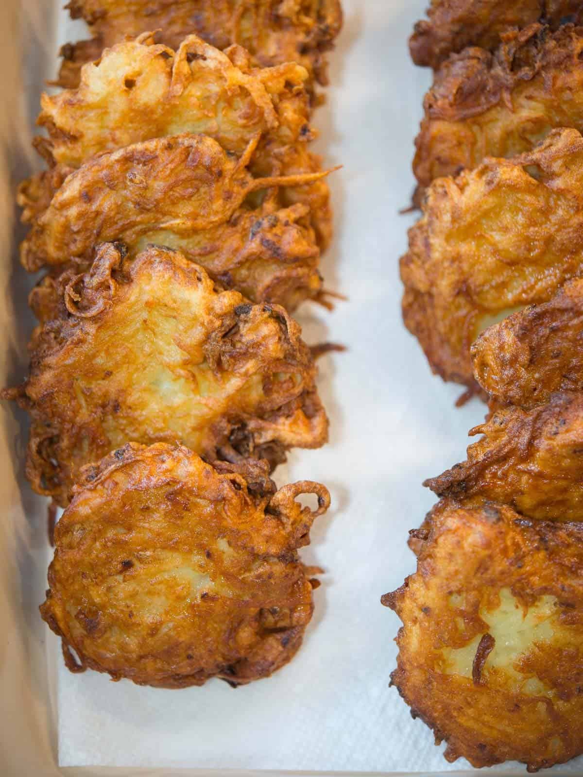 latkes draining on a paper towel