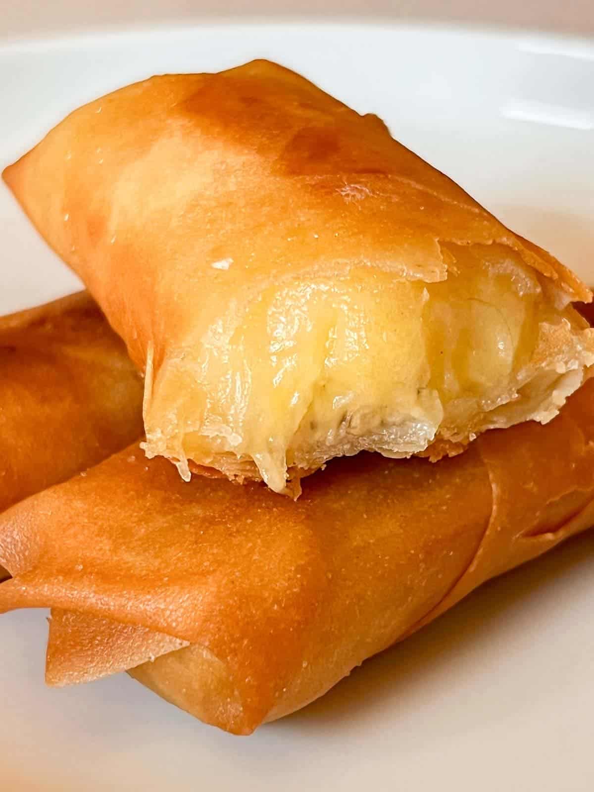 sweet banana lumpia with a bite out