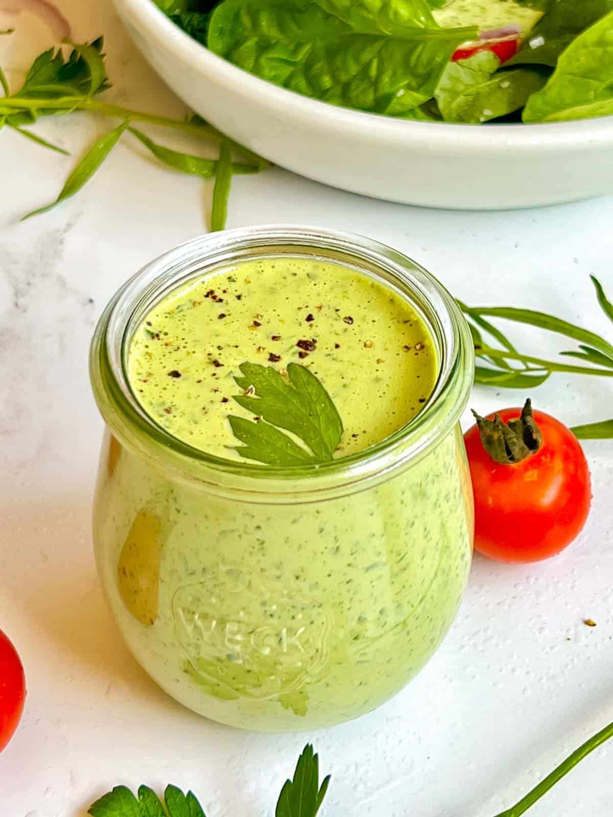 beautiful green goddess dressing in a glass jar