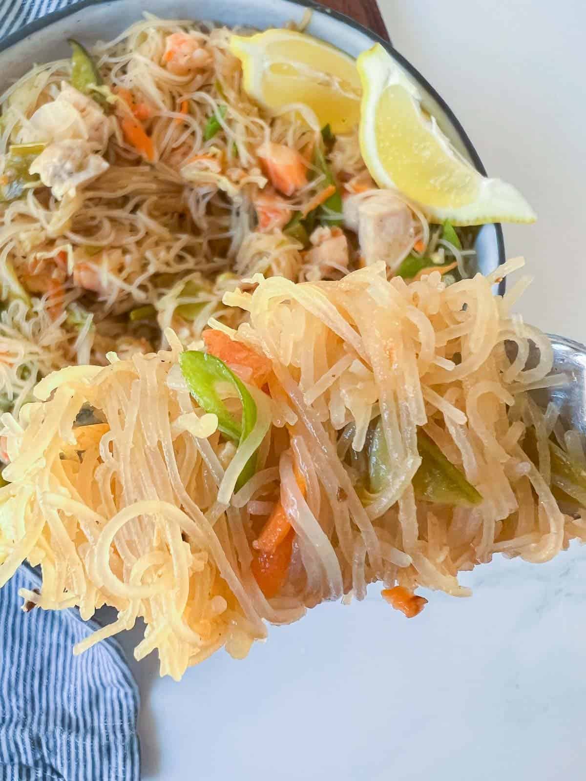 pancit noodles on a fork