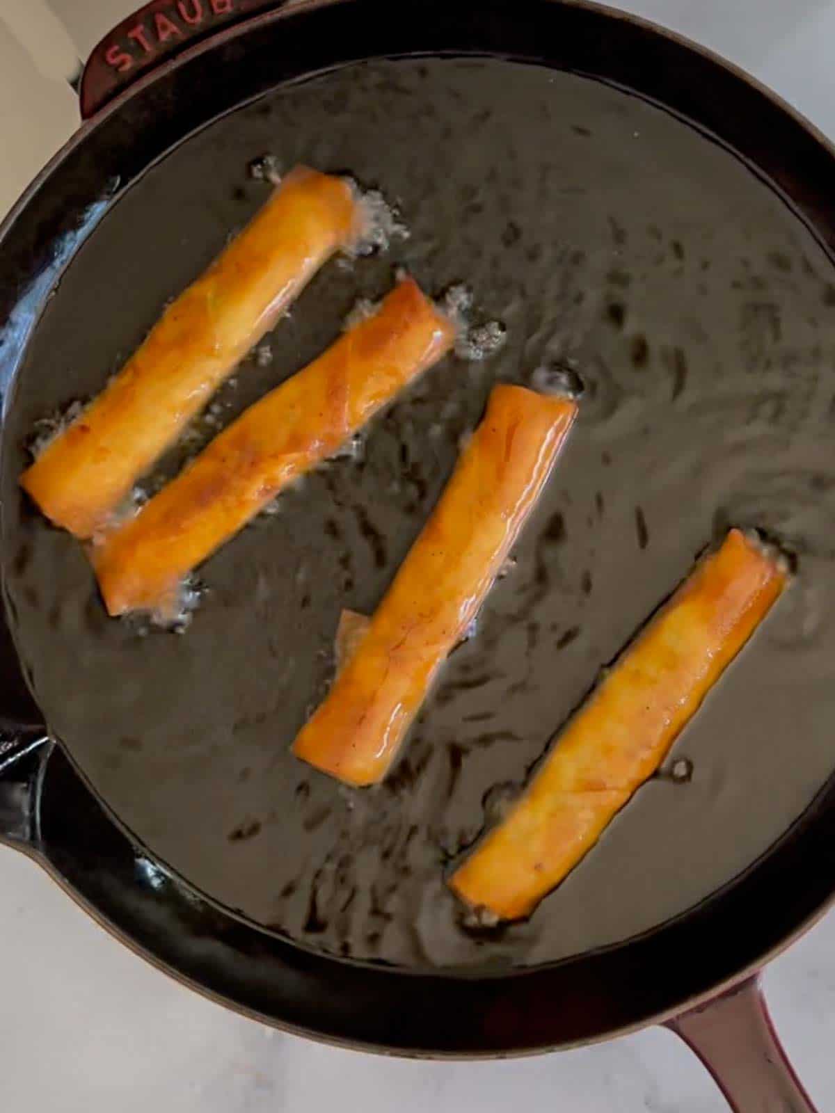 deep fry the lumpia until it's golden brown