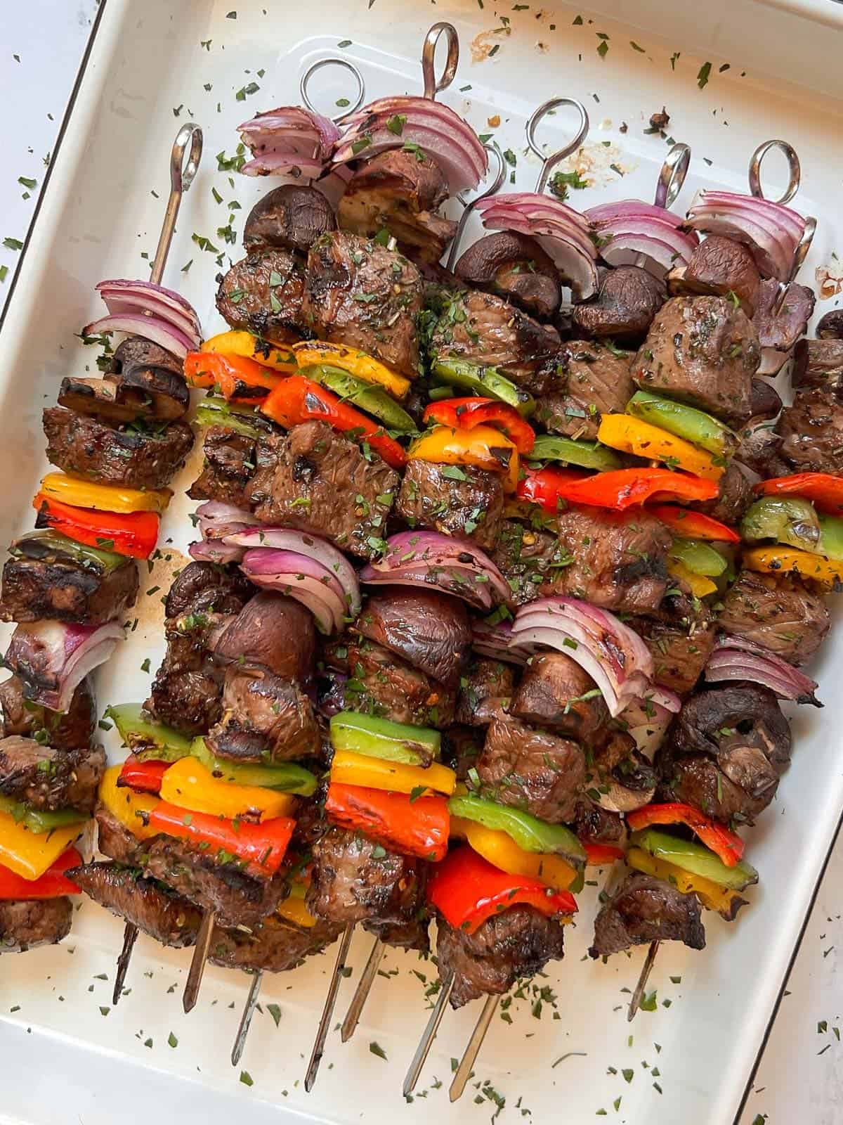 the best beef kabob recipe served on a white tray