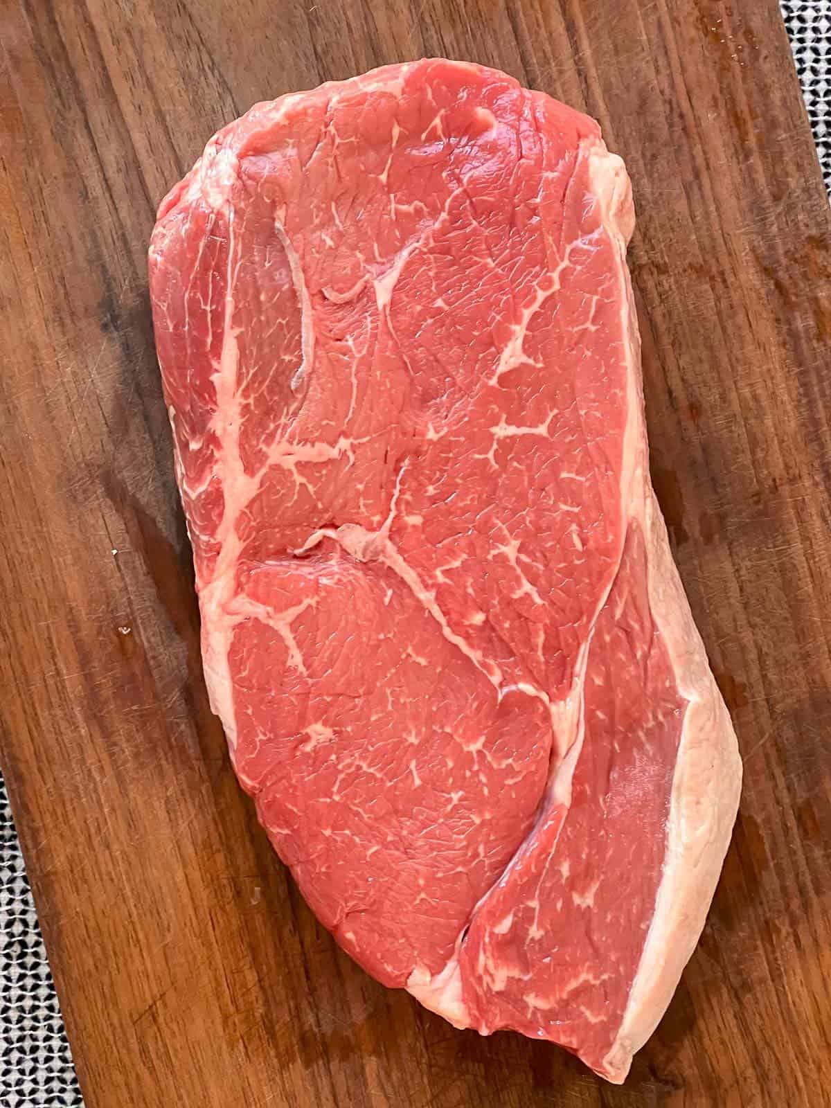 top sirloin steak on a cutting board