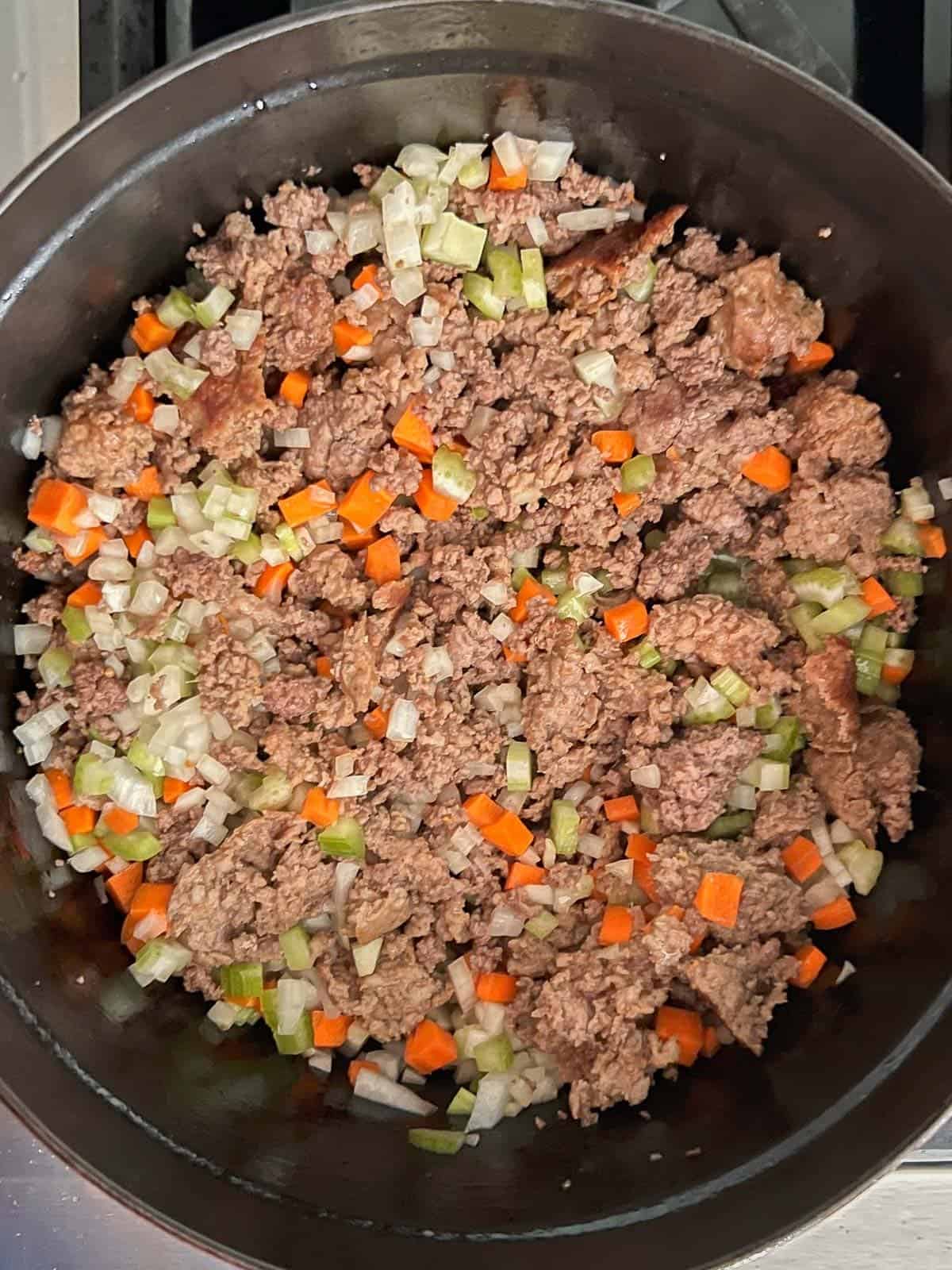 meat and vegetable in a dutch oven 