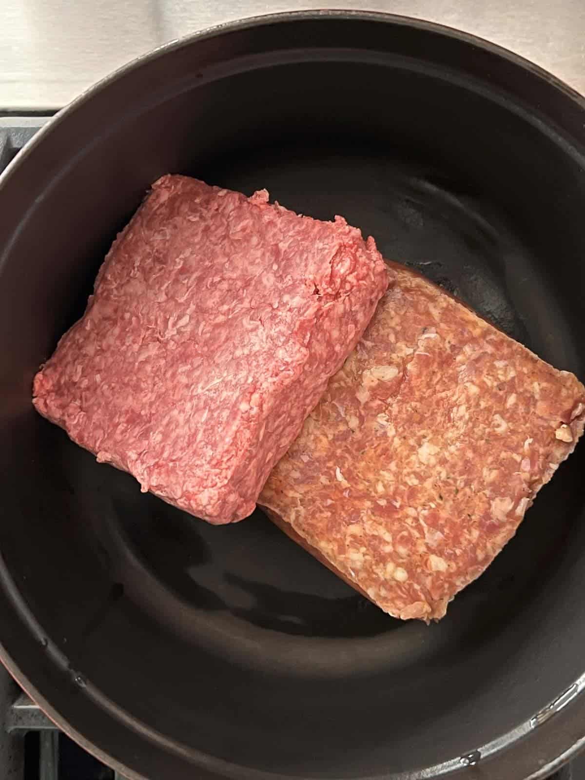 ground beef and ground pork in a dutch oven