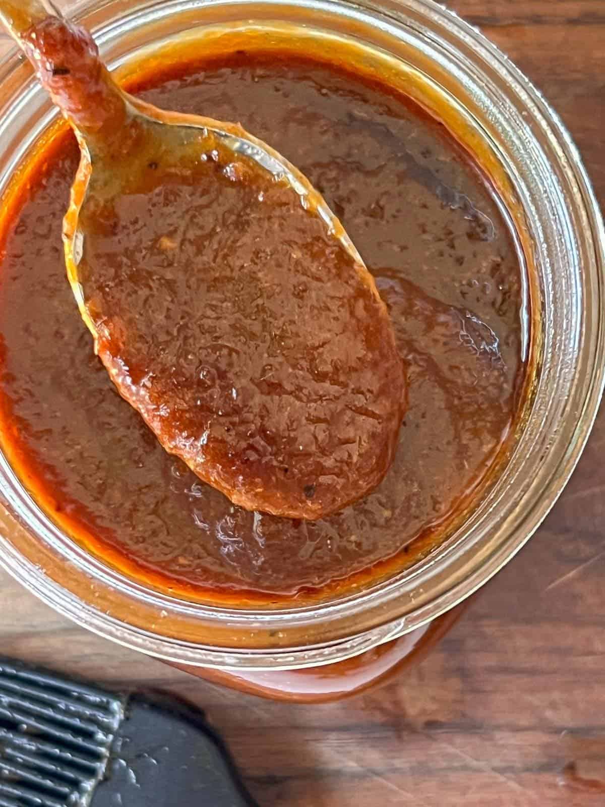 spoonful of bbq sauce showing it's smooth texture