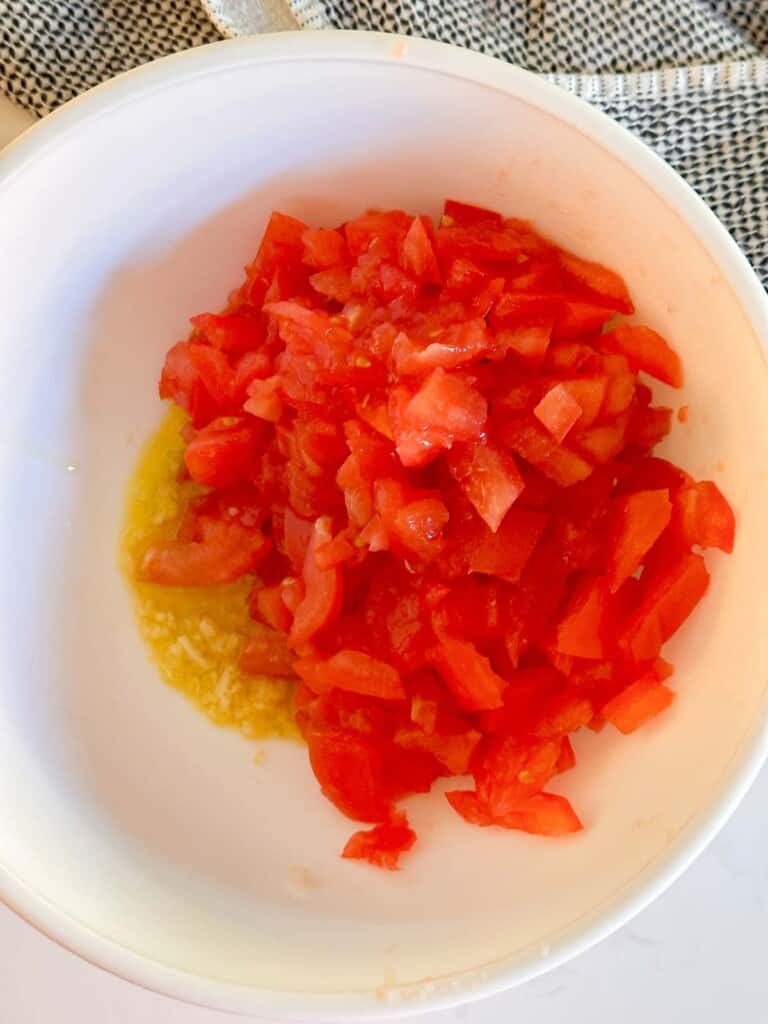 add the diced tomatoes to the bowl