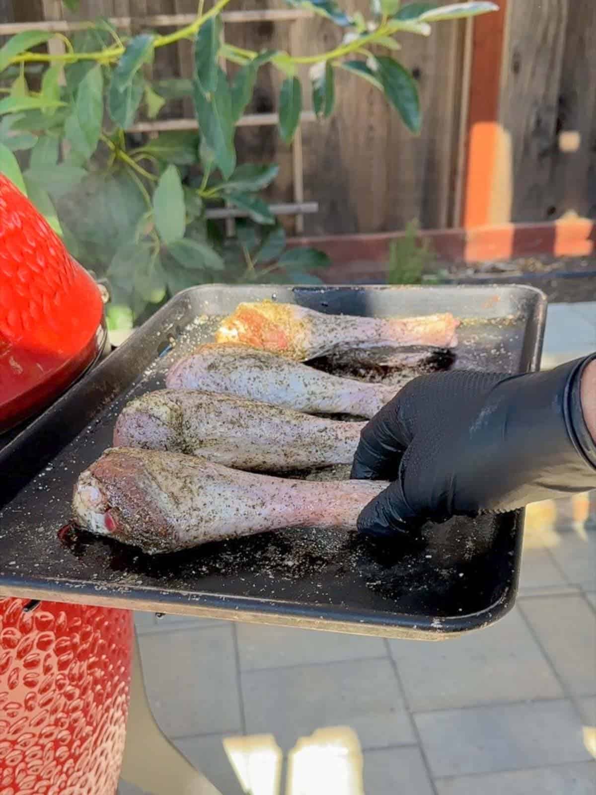 dry rubbed turkey legs ready for the smoker