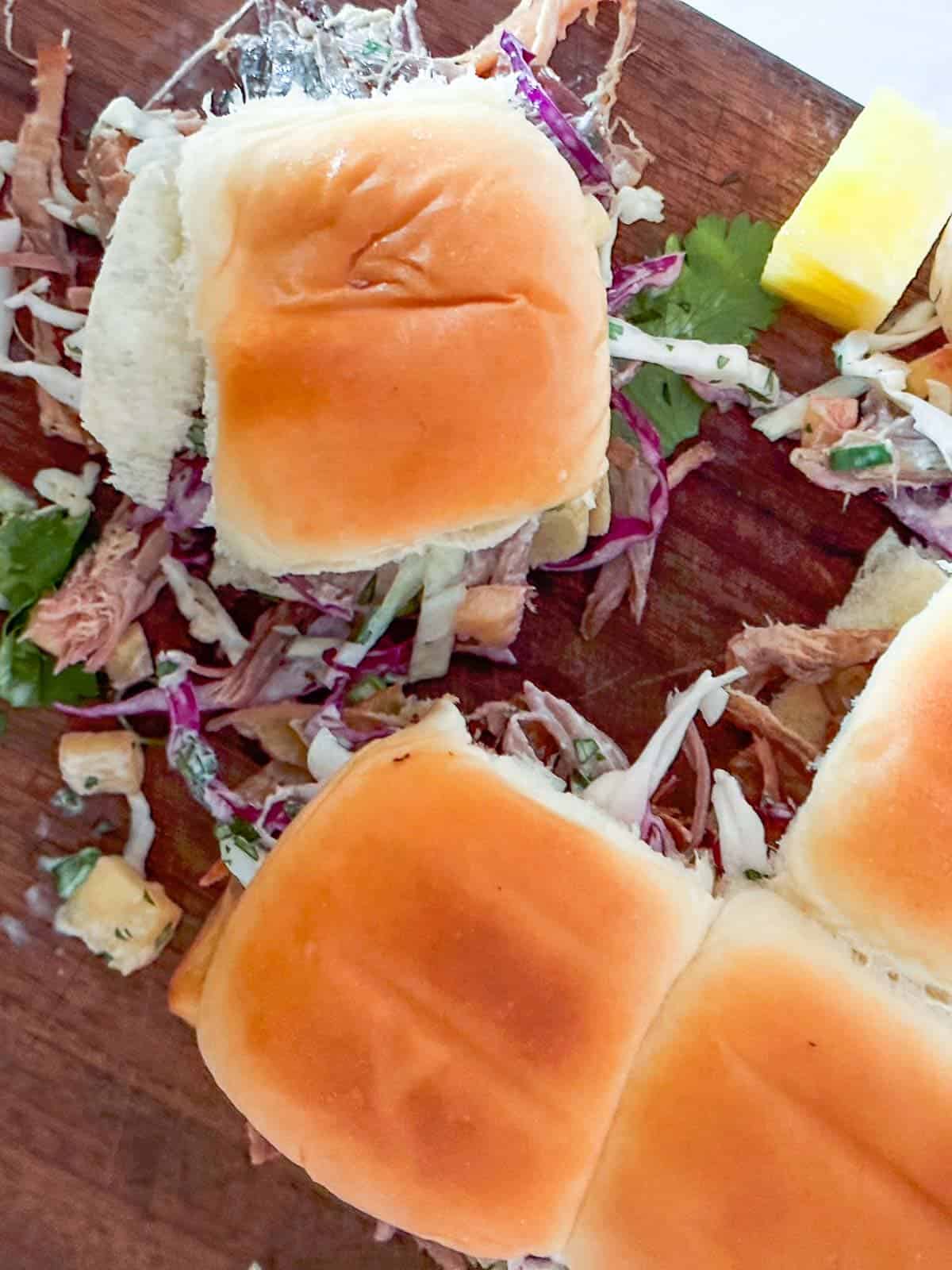 Kalua pork slider with pineapple slaw and king's hawaiian rules