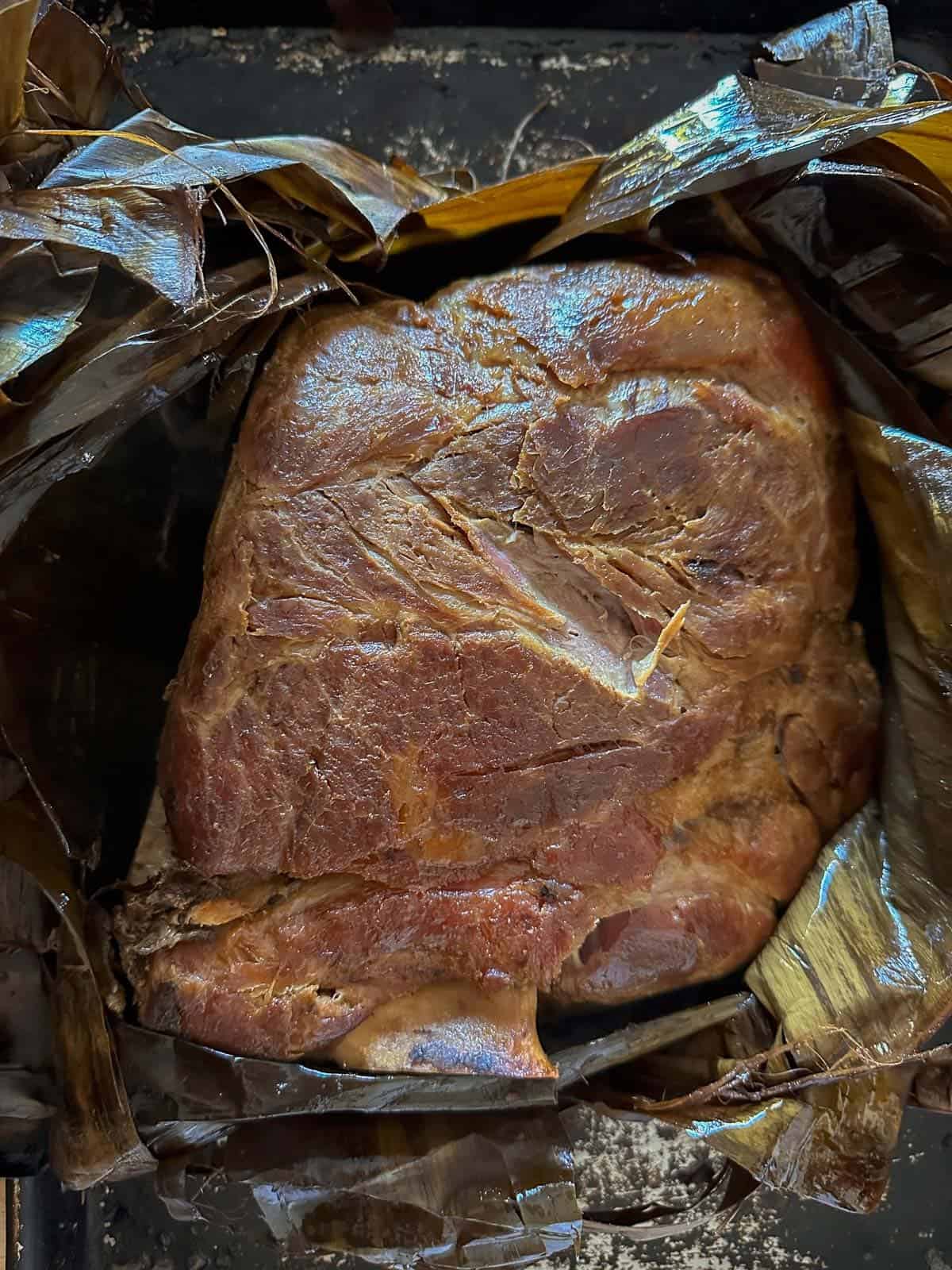 kalua pork unwrapped after smoking