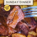 I bite of super tender pot roast with gravy