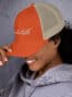 retro-trucker-hat-rustic-orange-khaki-left-64234ff6005a9.jpg