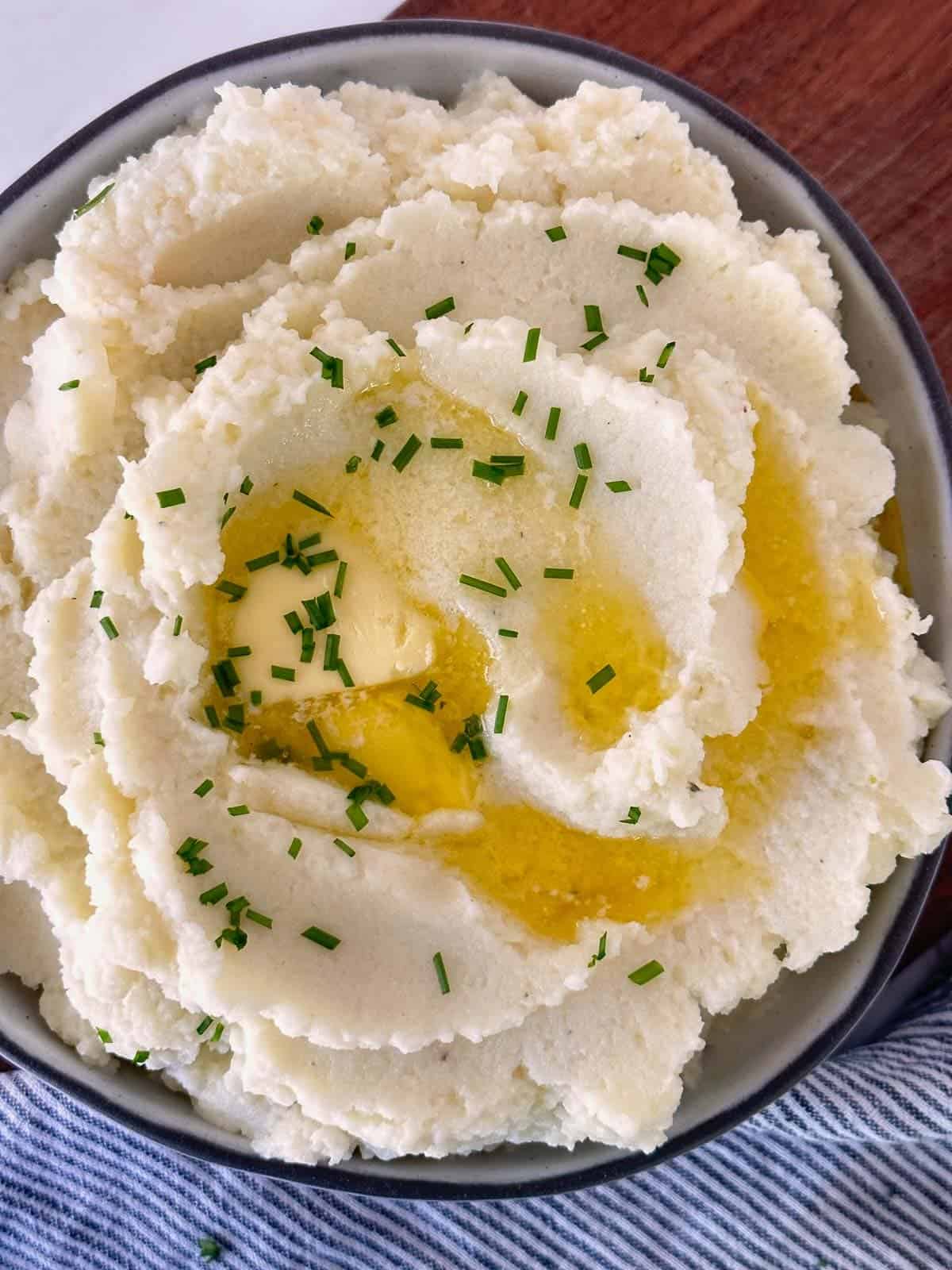 cauliflower mash topped with butter and chives