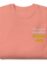 salmon pink folded sweatshirt with "cheese is always the secret ingredient"