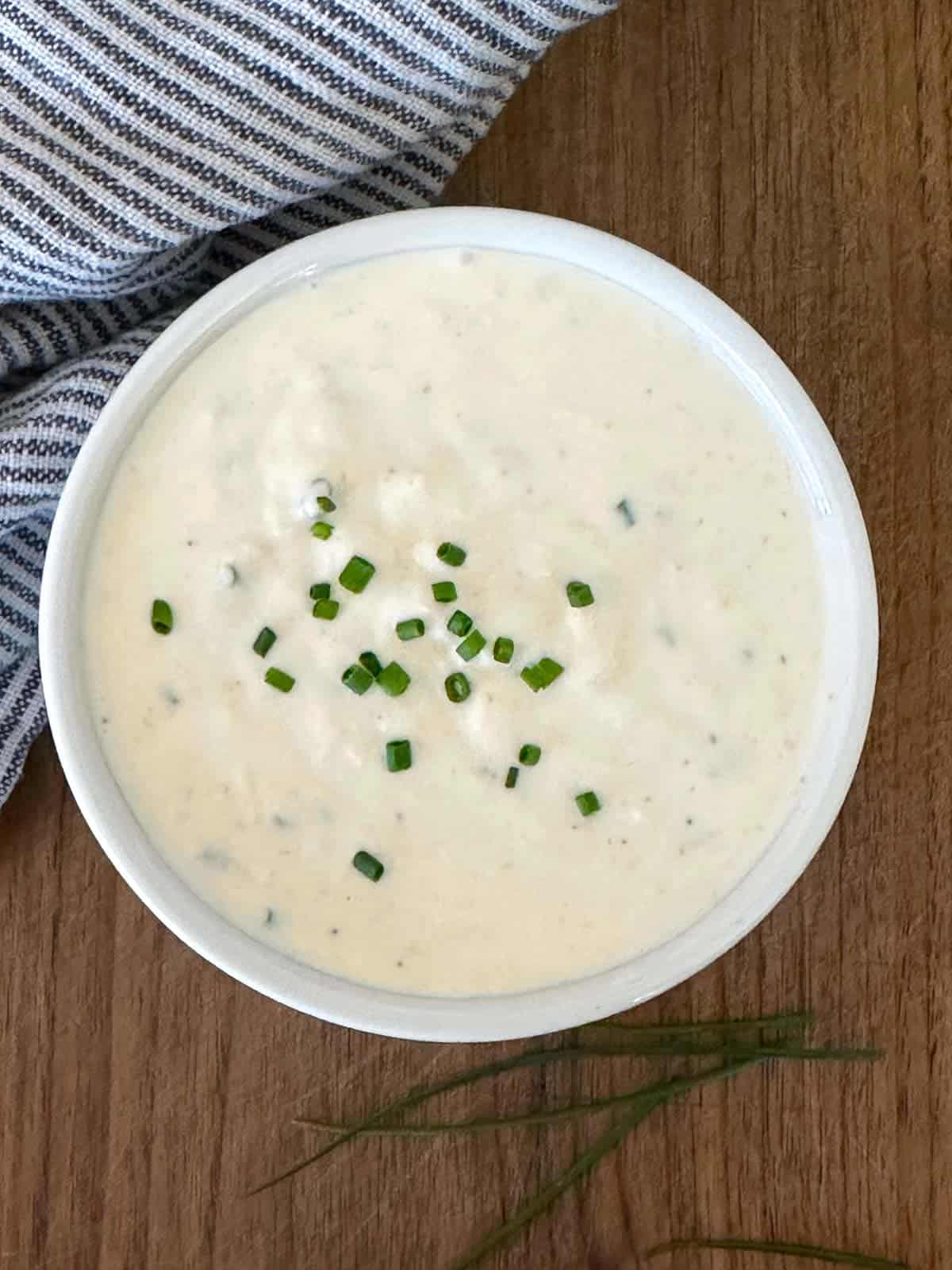 homemade horseradish cream sauce topped with chives