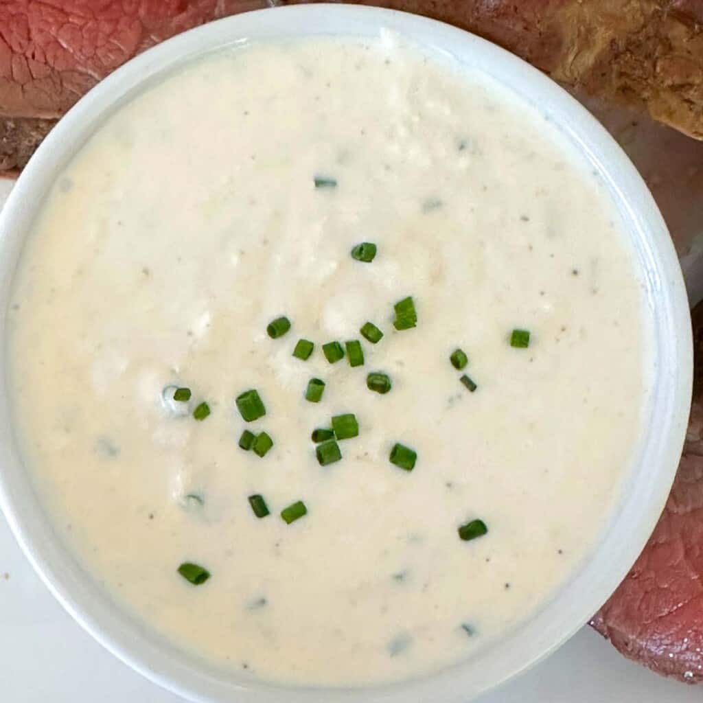 homemade horseradish cream sauce topped with minced chives