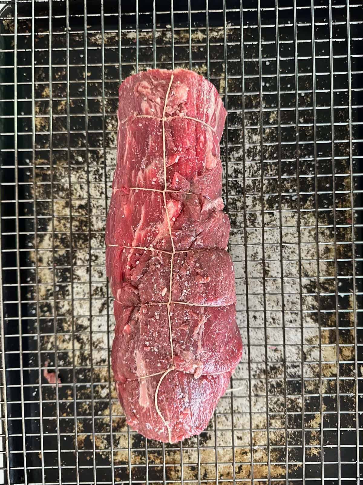 beef tenderloin roast tied with kitchen twine