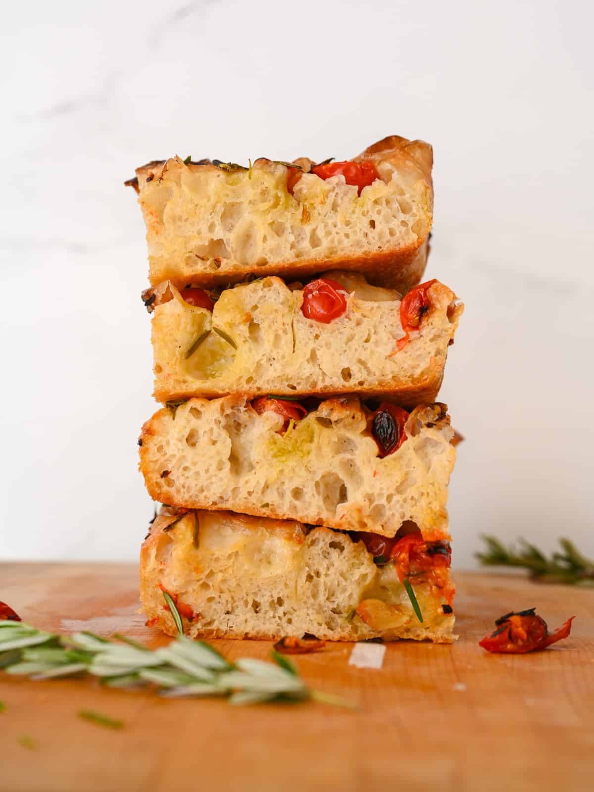 a stack of tomato focaccia bread 