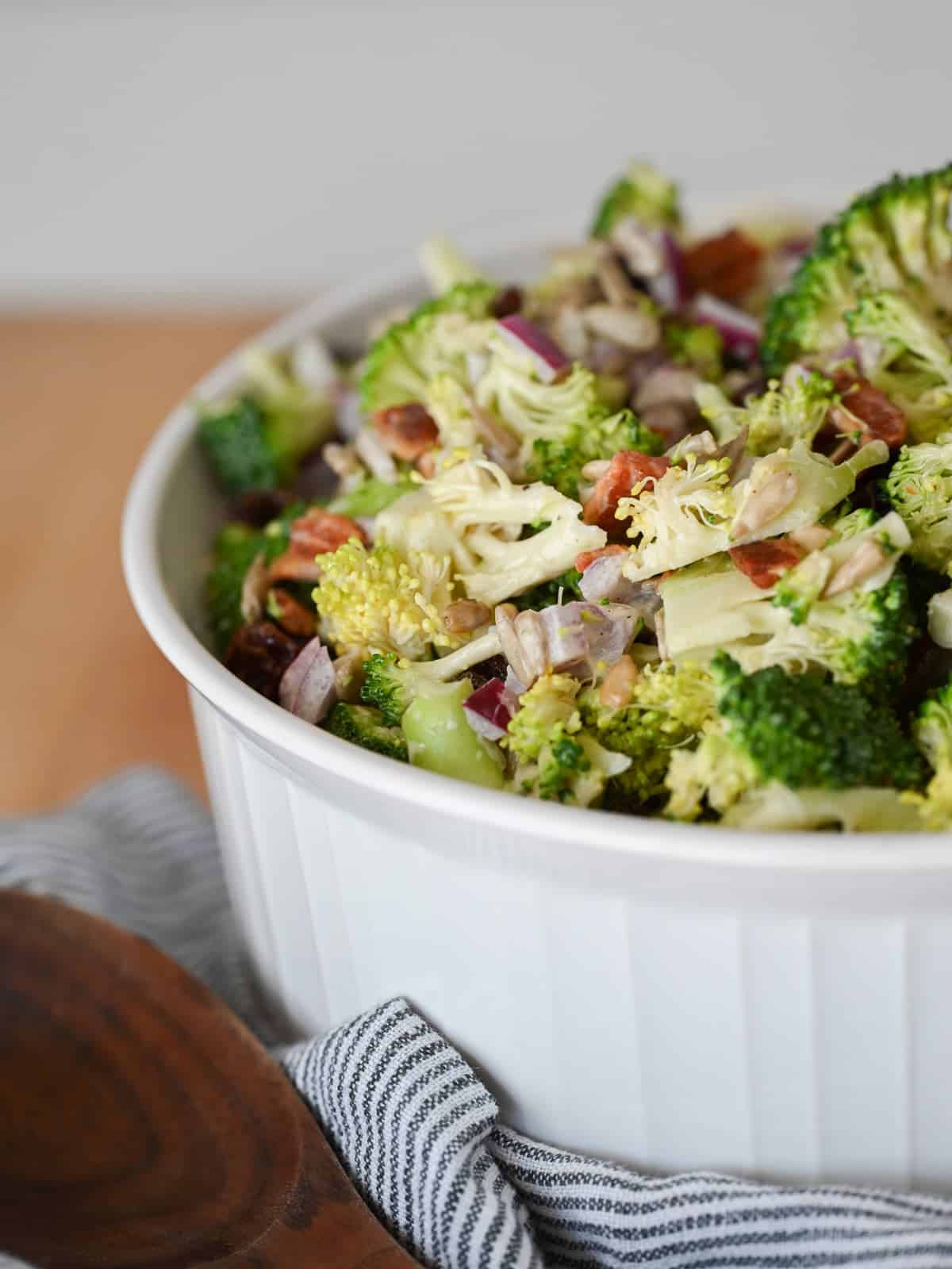 side crispy broccoli salad with bacon and red onions.