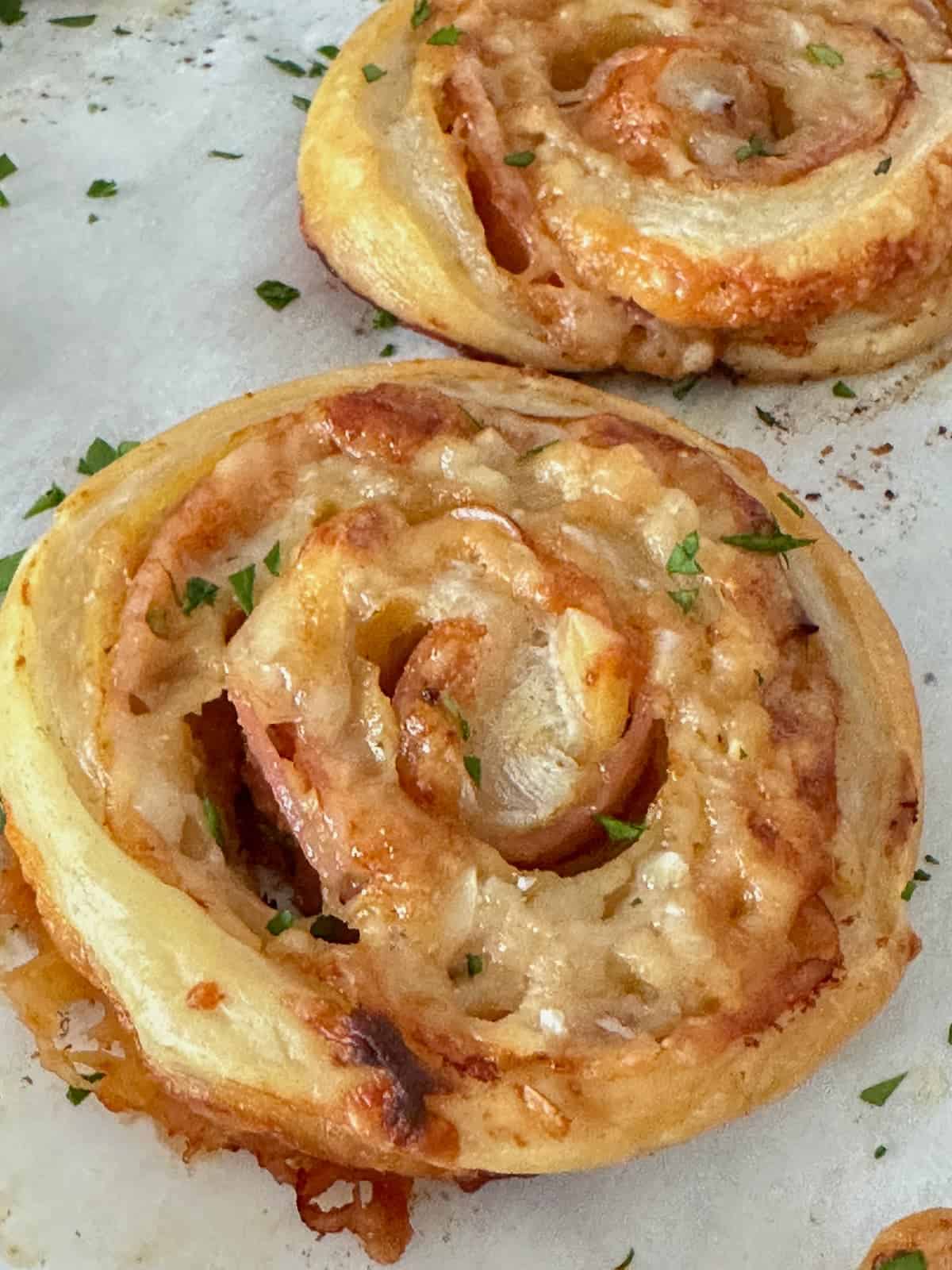 close up of ham and cheese pinwheels cheesy goodness