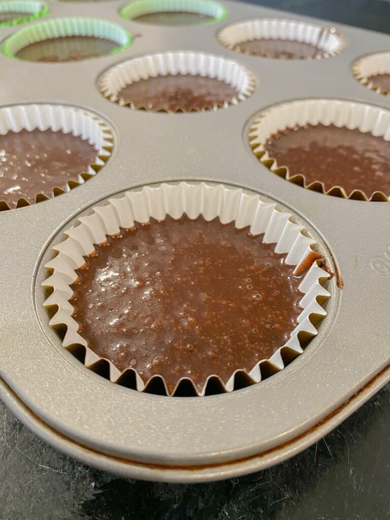 close up of batter in a cupcake liner