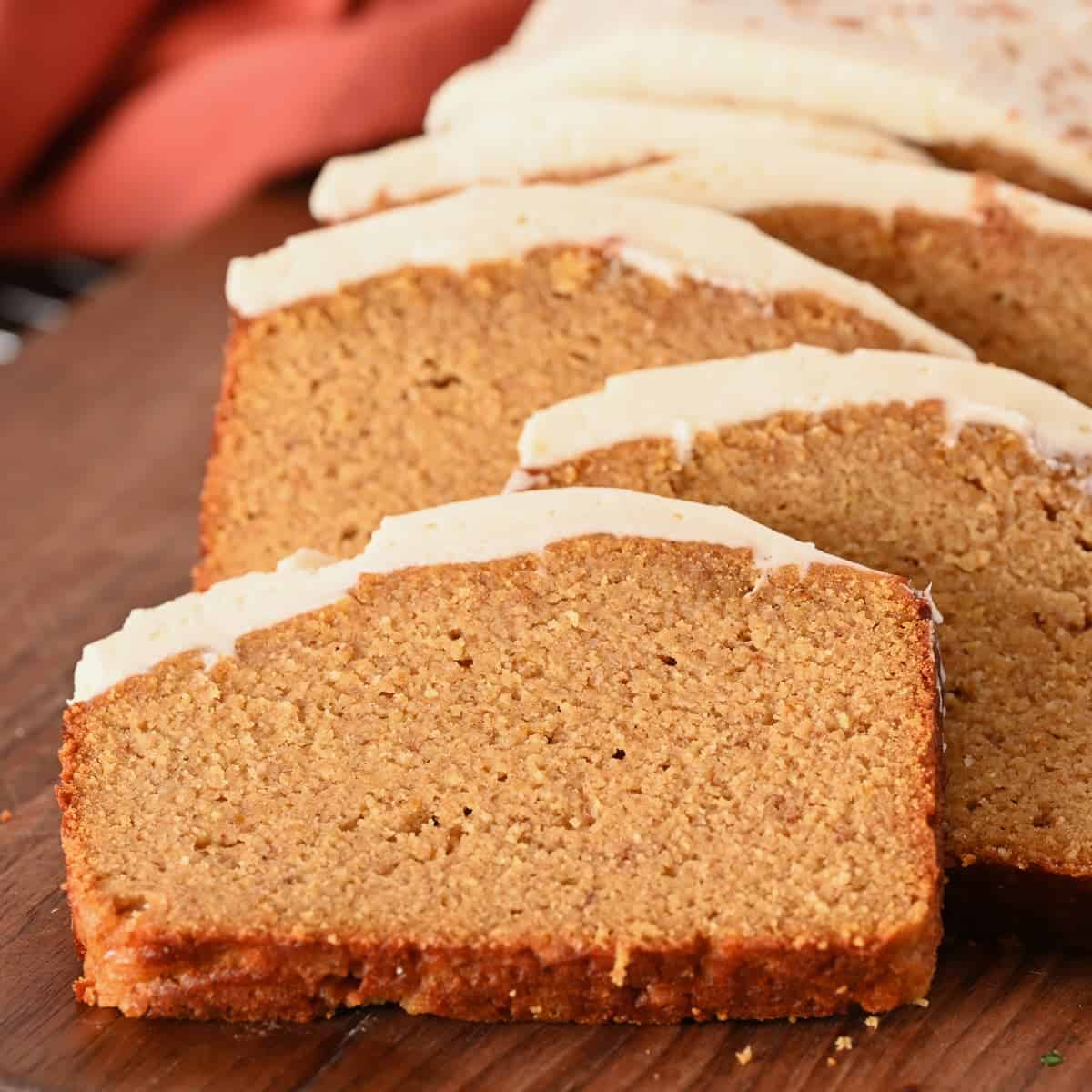 gluten free pumpkin bread recipe sliced on a cutting board