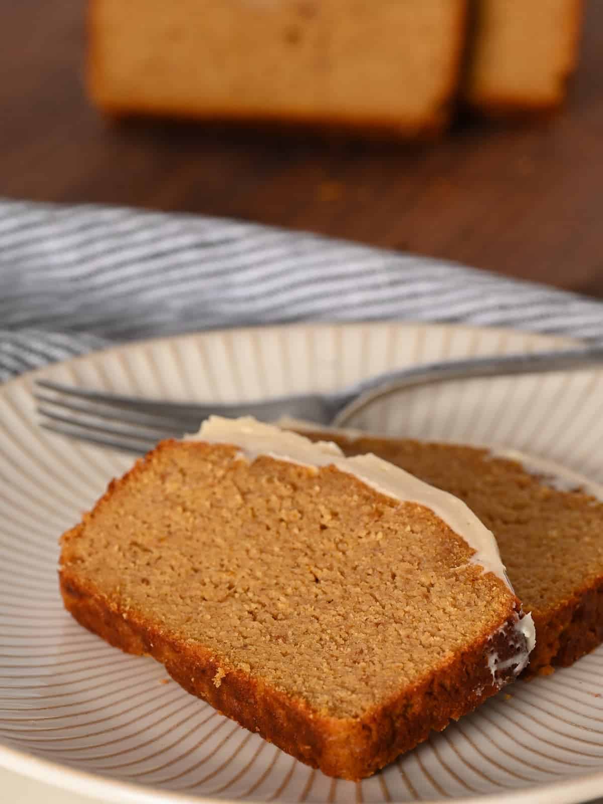 slices of gluten free pumpkin bread showing the tender texture