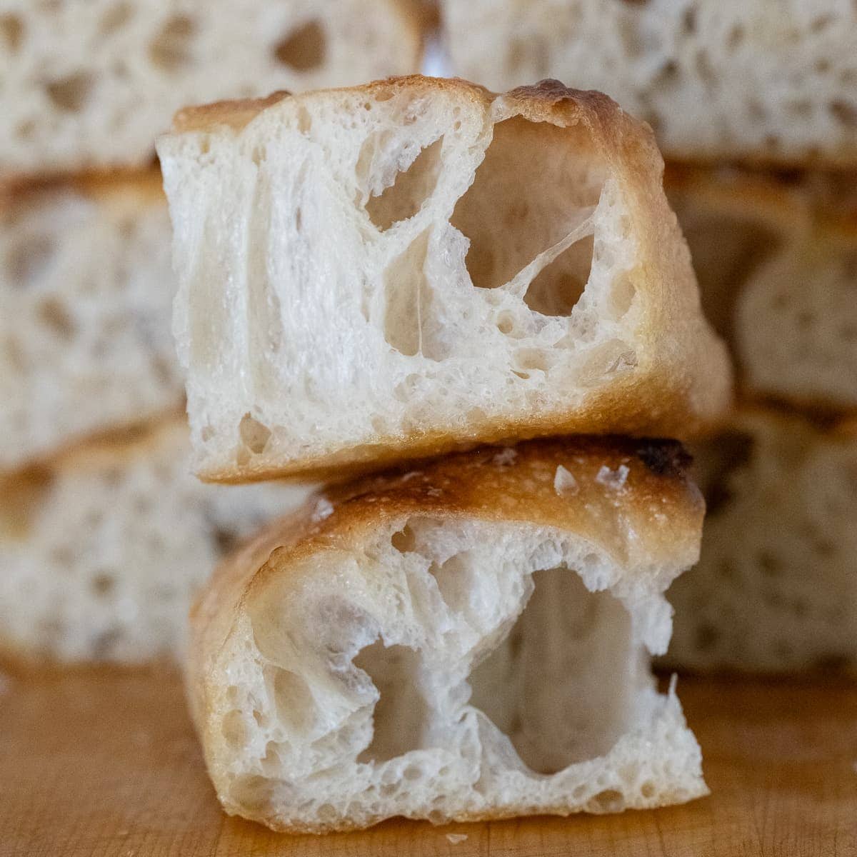 a stack of focaccia bread sliced into chunks