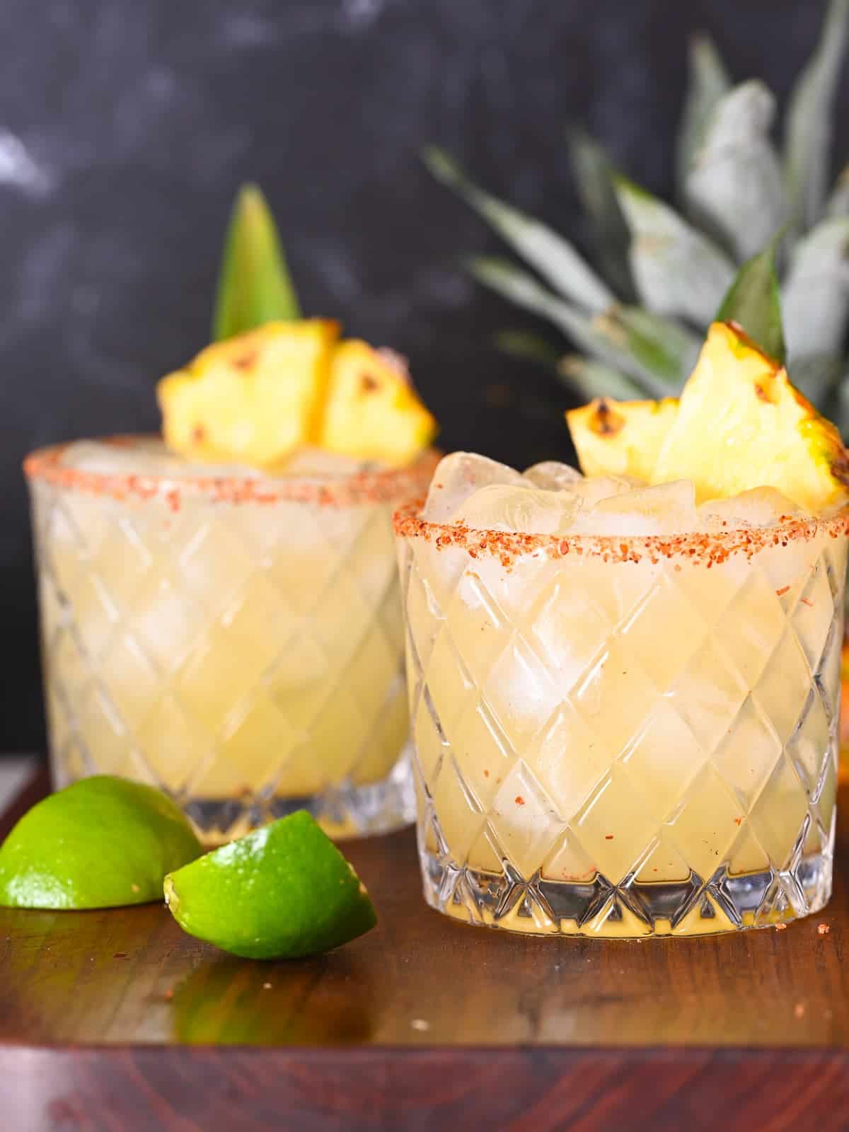 Pineapple margarita served with chile lime salt rim