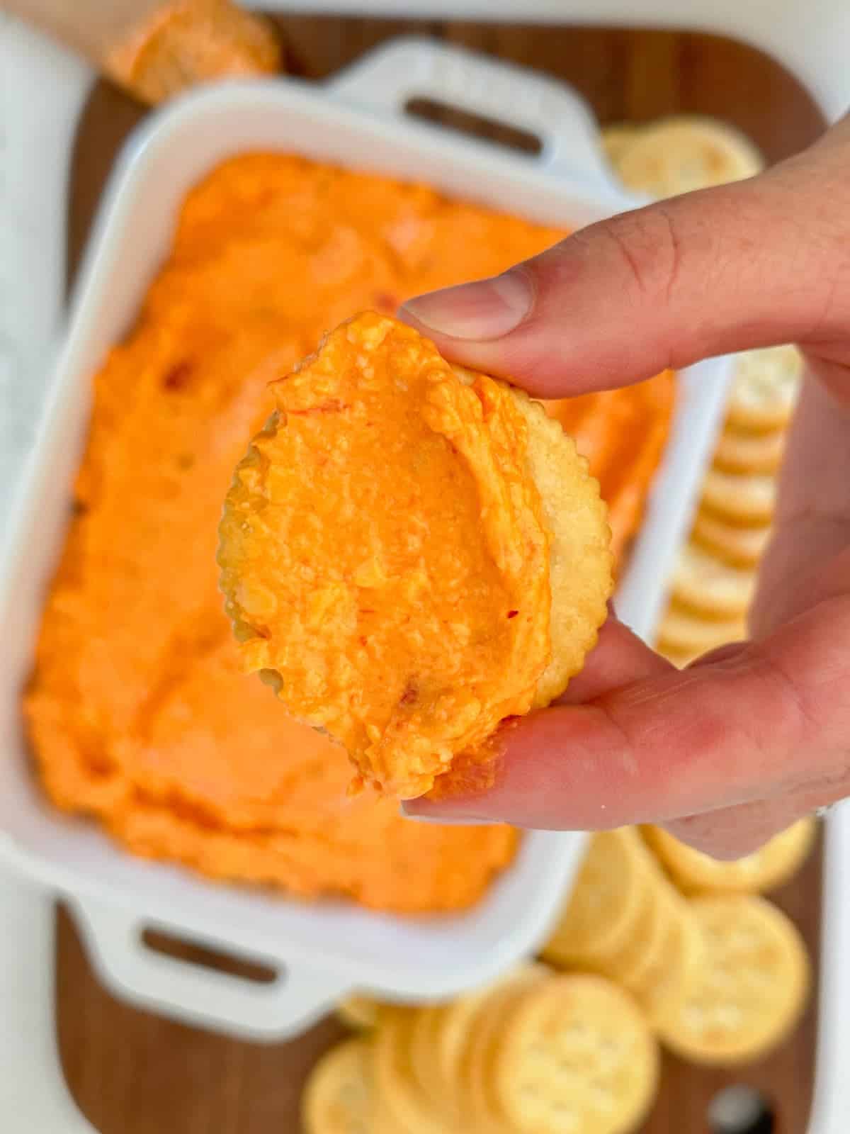 close up of pimento cheese on a ritz cracker