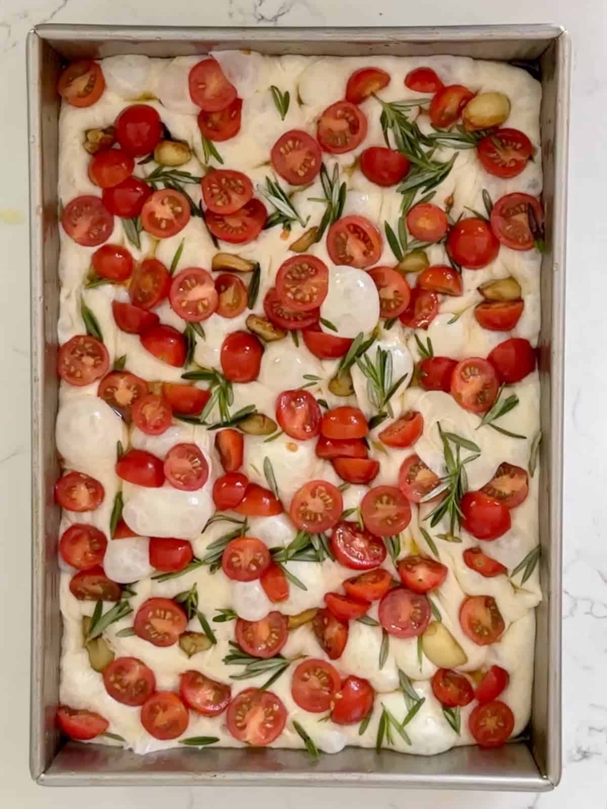 tomato focaccia bread before baking