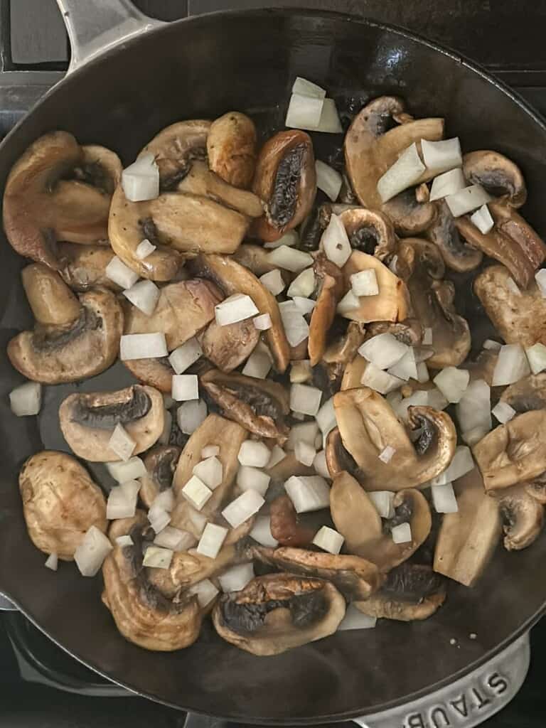 add the onions to the mushrooms