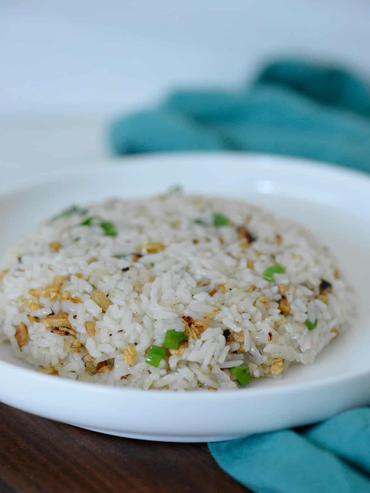 filipino garlic fried rice served on a plate