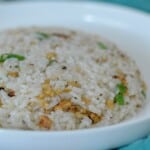 garlic fired rice recipe on a white plate