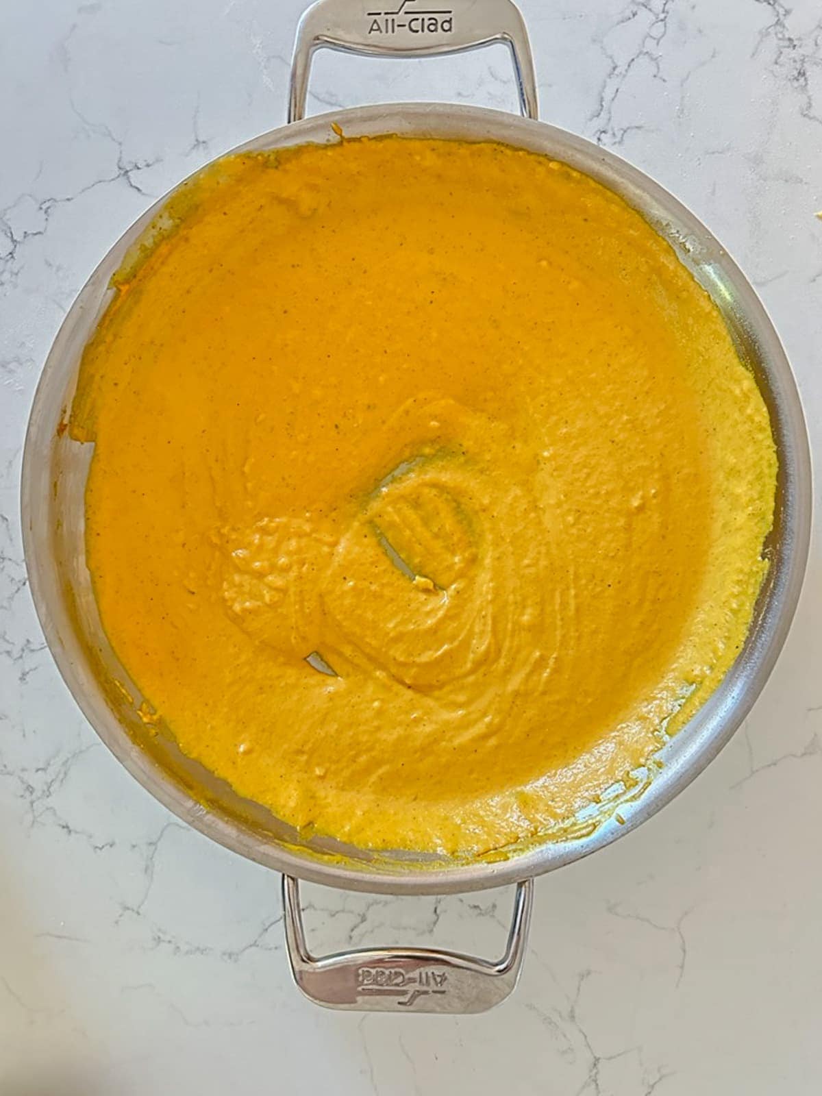 pan of creamy pumpkin pasta sauce