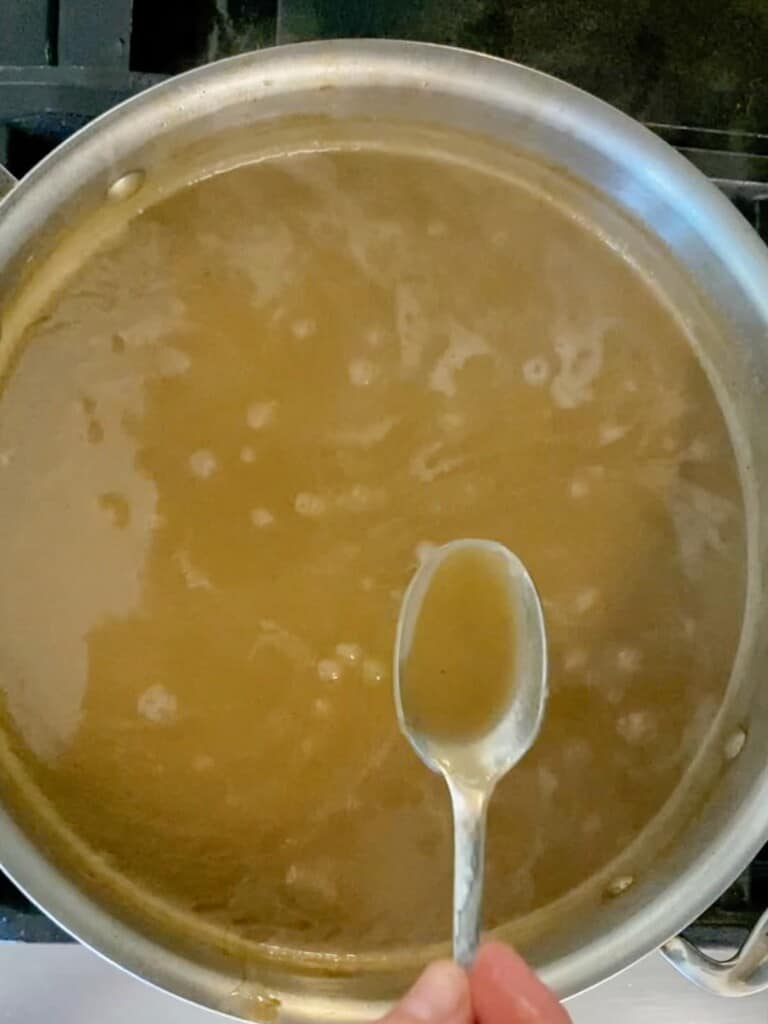 reduce the heat and simmer the turkey gravy until it is thick.