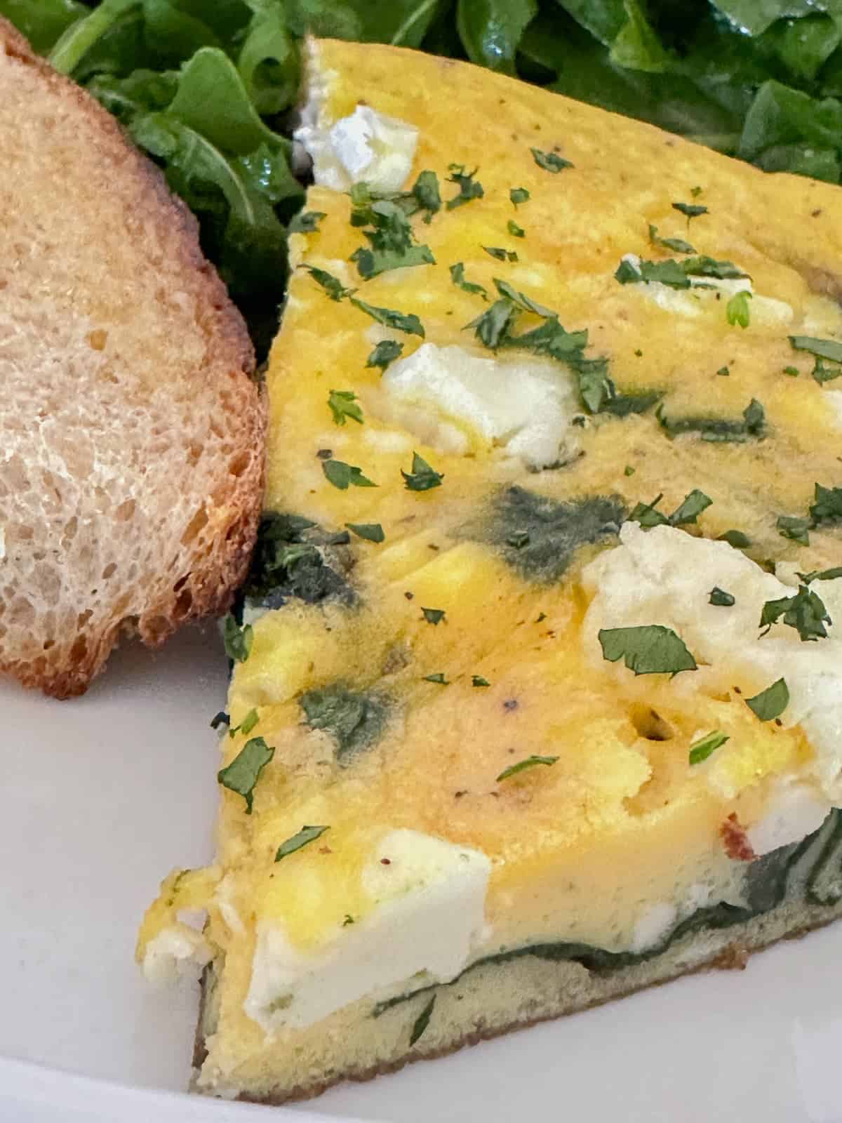 close up of spinach and feta frittata