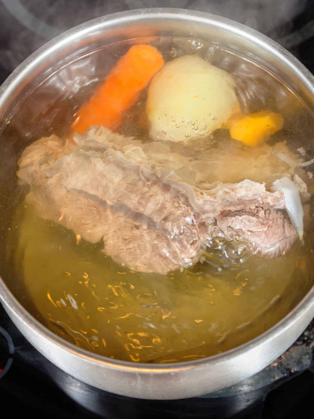 a pot of homemade turkey stock 