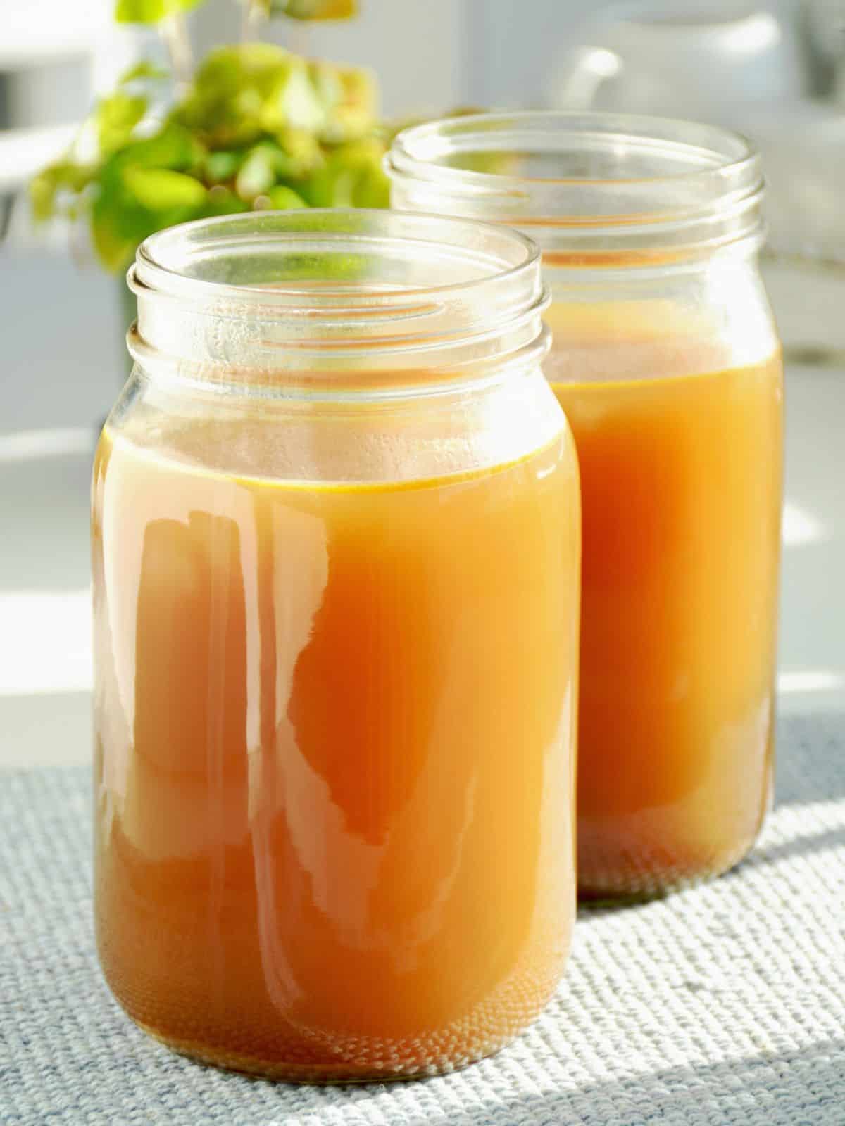 jars of turkey stock ready to use for homemade soup