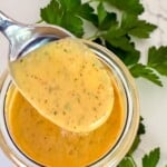 creamy buffalo ranch dressing on a spoon