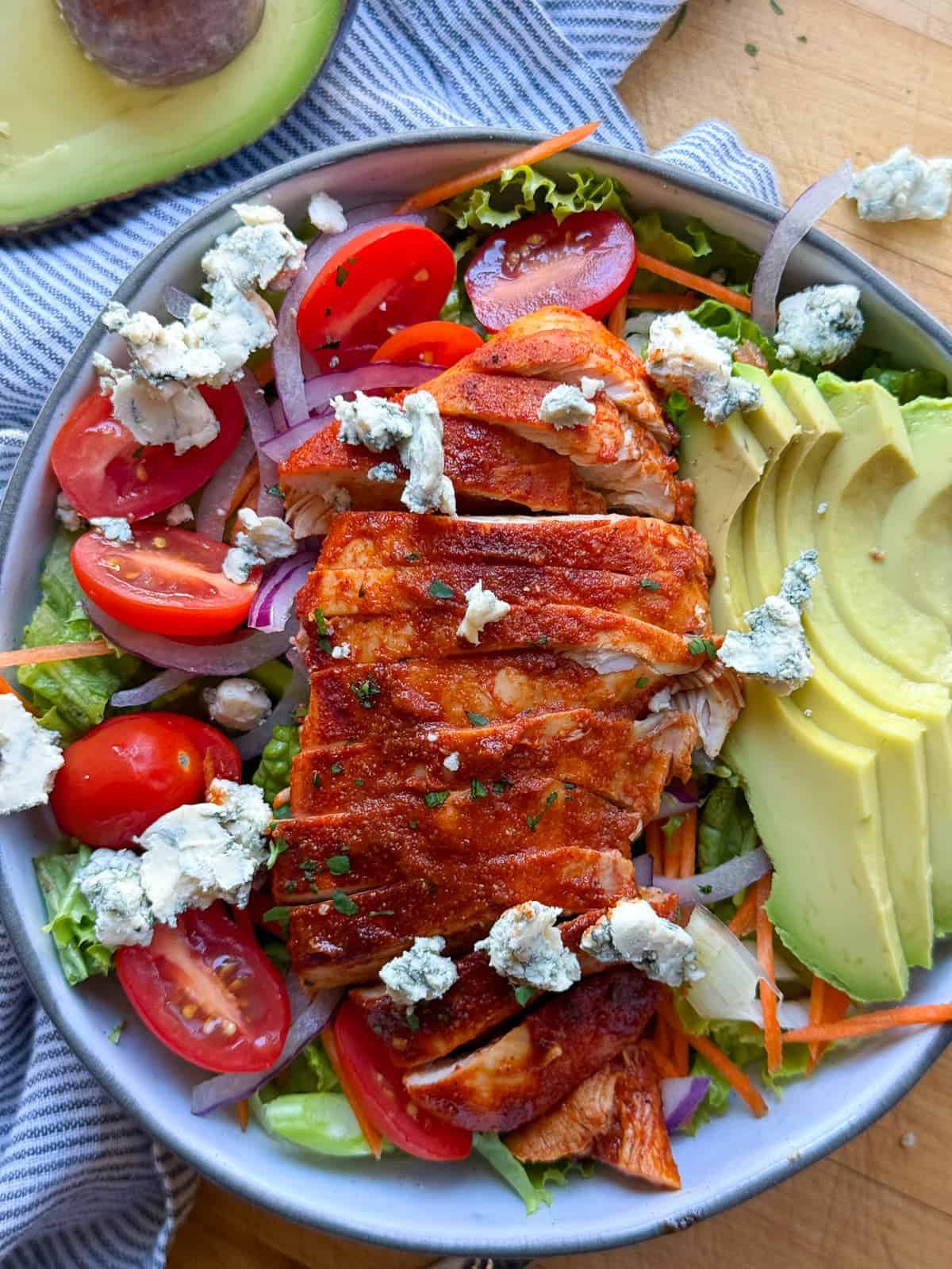 healthy buffalo chicken salad with avocado and buffalo ranch dressing