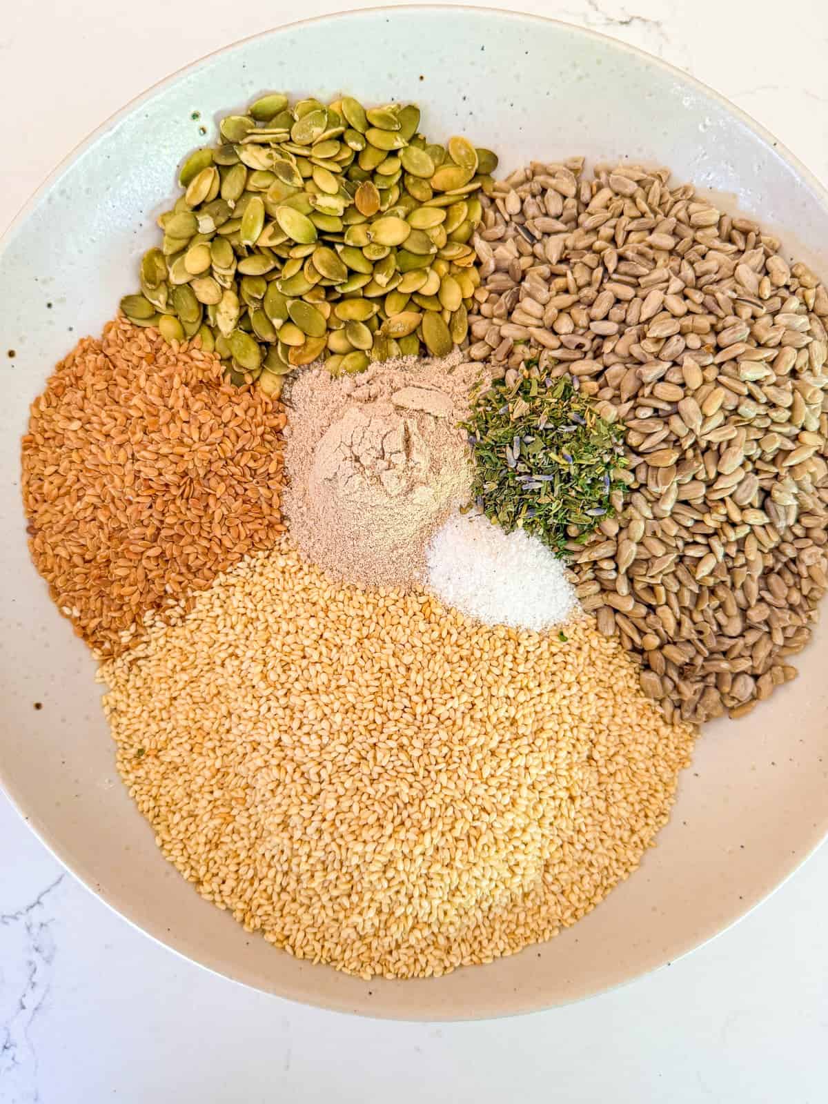 Ingredients for the seed crackers in a bowl