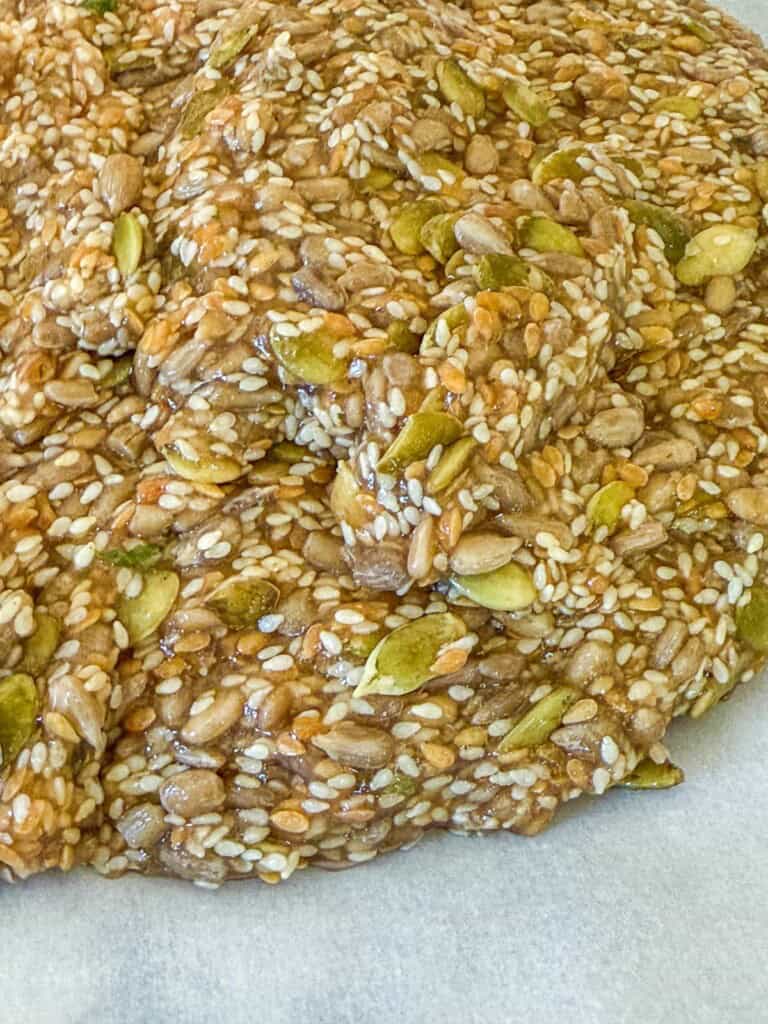 Mixed water of ingredients for seed crackers and then it becomes a gel like consistency